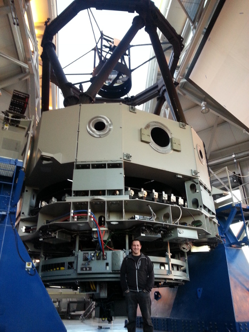 Veyette standing beside the Discovery Channel Telescope, Lowell Observatory, AZ - image courtesy: M. Veyette